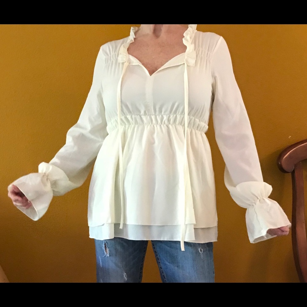 Cream colored blouse china size L US small/med.